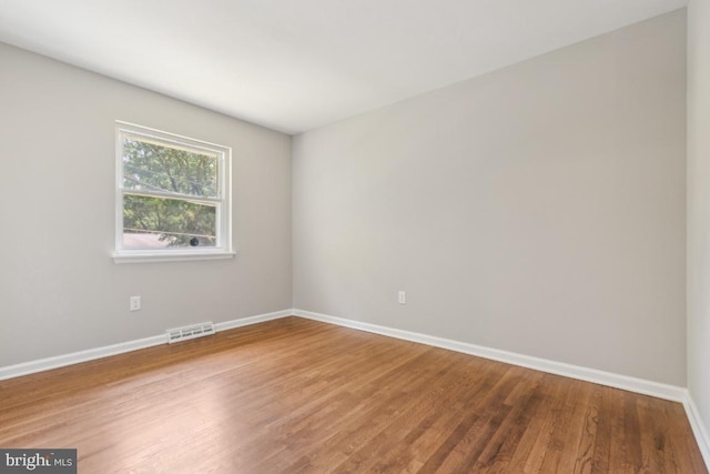 3713 Deming Dr, Suitland, MD 20746 - unfurnished room with baseboards and wood finished floors