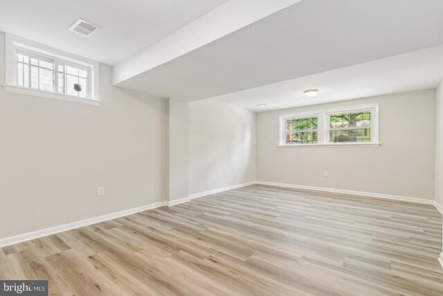 3713 Deming Dr, Suitland, MD 20746 - basement with light wood-style flooring and baseboards