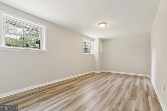 3713 Deming Dr, Suitland, MD 20746 - spare room with light wood-type flooring and baseboards
