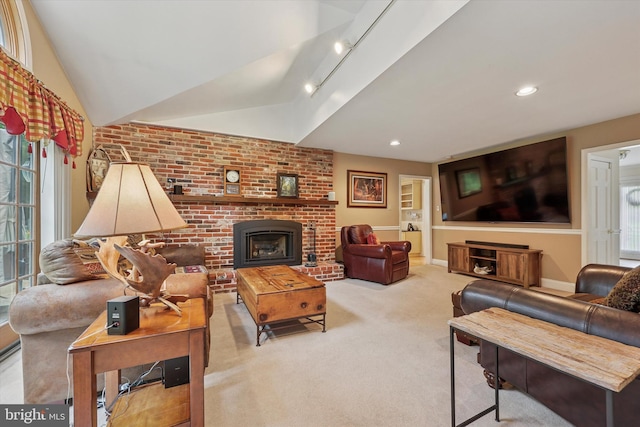 609 Ederer Ln, Ambler, PA 19002 - living room featuring a fireplace, carpet flooring, vaulted ceiling, and brick wall