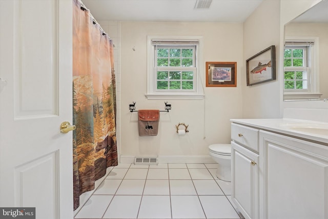 609 Ederer Ln, Ambler, PA 19002 - bathroom with vanity, healthy amount of natural light, toilet, and tile patterned floors