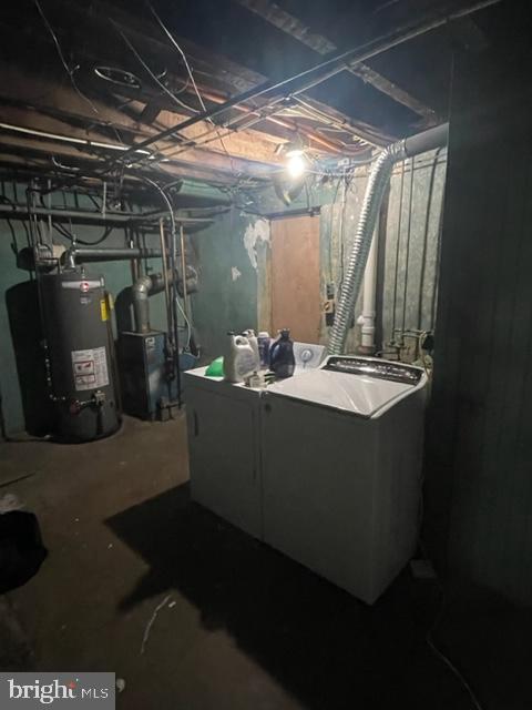 2632 Lenape Rd, Philadelphia, PA 19131 - unfinished basement featuring gas water heater, washer and clothes dryer, and a heating unit