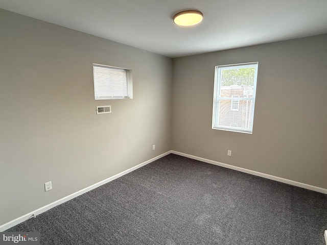 2127 Melvin St, Philadelphia, PA 19131 - unfurnished room with baseboards and dark colored carpet