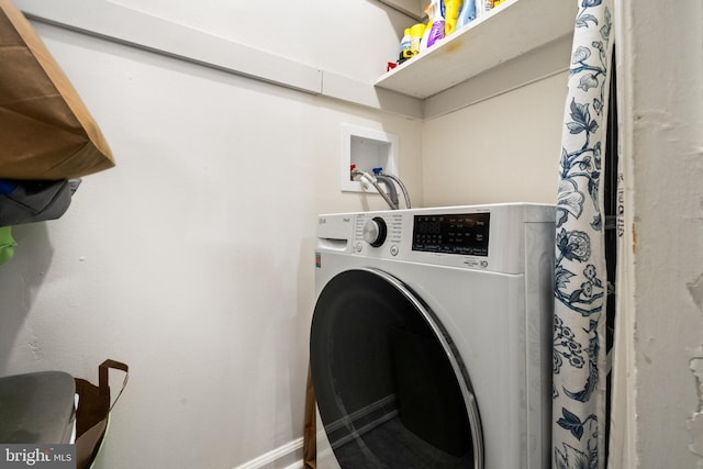 5907L Noblestown Rd Unit 72, Springfield, VA 22152 - laundry room with washer / dryer and baseboards
