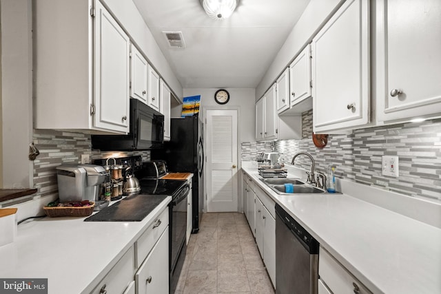 5907L Noblestown Rd Unit 72, Springfield, VA 22152 - kitchen featuring black appliances, a sink, white cabinetry, tasteful backsplash, and light countertops