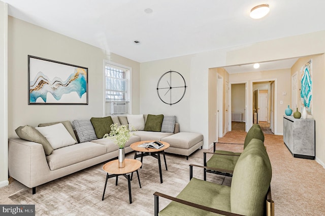 616 Mellon St SE, Washington, DC 20032 - living room with baseboards, light carpet, and cooling unit