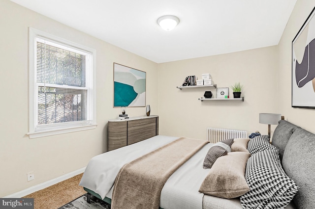 616 Mellon St SE, Washington, DC 20032 - carpeted bedroom featuring radiator and baseboards