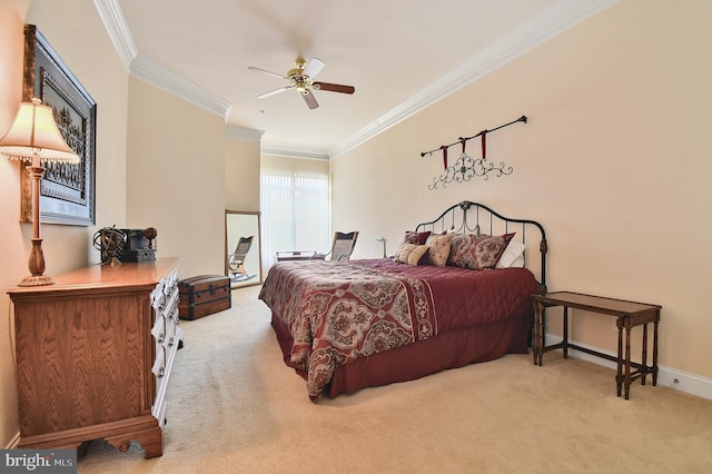 7207 Ivy Bank Rd, Laurel, MD 20707 - carpeted bedroom with ornamental molding, baseboards, and ceiling fan