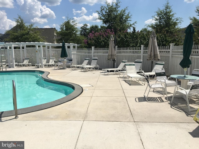 7207 Ivy Bank Rd, Laurel, MD 20707 - community pool featuring a patio area