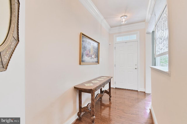7207 Ivy Bank Rd, Laurel, MD 20707 - entryway with baseboards, ornamental molding, and wood finished floors