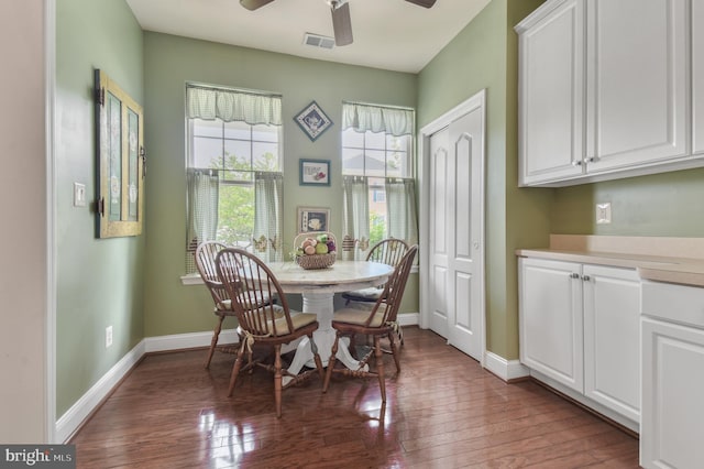 7207 Ivy Bank Rd, Laurel, MD 20707 - dining space featuring wood finished floors, a ceiling fan, and baseboards