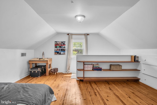 451 C St, Carlisle, PA 17013 - bedroom with wood-type flooring, lofted ceiling, and baseboards