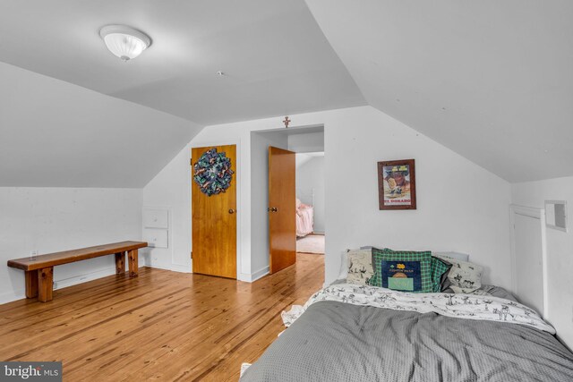 451 C St, Carlisle, PA 17013 - bedroom with wood finished floors and vaulted ceiling