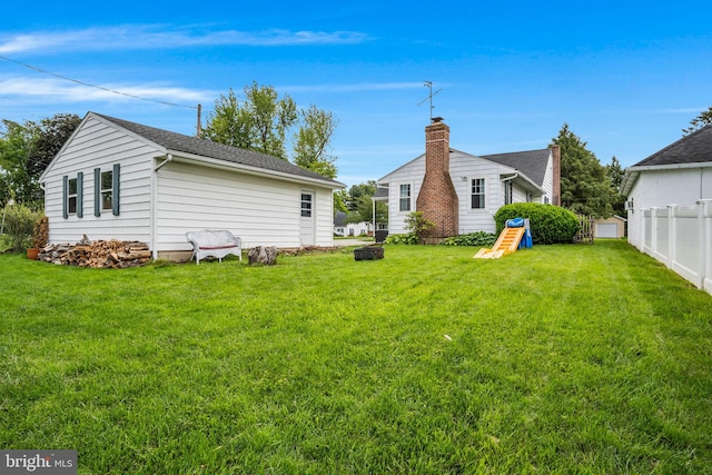 451 C St, Carlisle, PA 17013 - rear view of house featuring a shingled roof