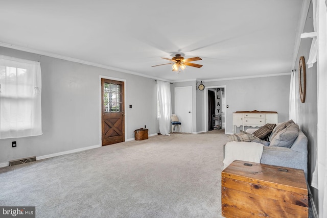 451 C St, Carlisle, PA 17013 - carpeted living room featuring crown molding, ceiling fan, and baseboards