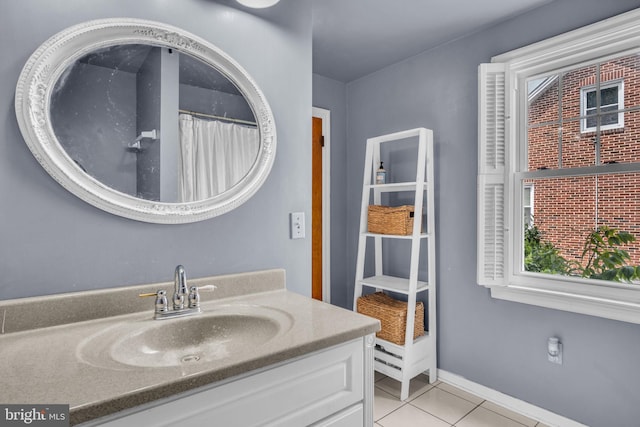 451 C St, Carlisle, PA 17013 - bathroom with vanity, tile patterned floors, and baseboards