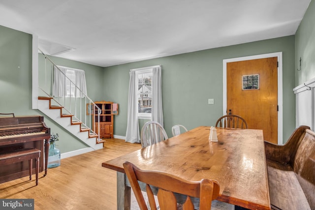 451 C St, Carlisle, PA 17013 - dining area featuring wood finished floors, baseboards, and stairs