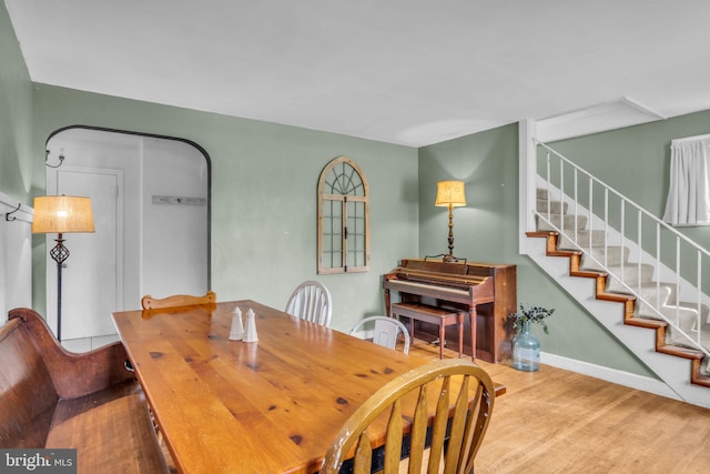 451 C St, Carlisle, PA 17013 - dining area featuring wood finished floors, stairway, and baseboards