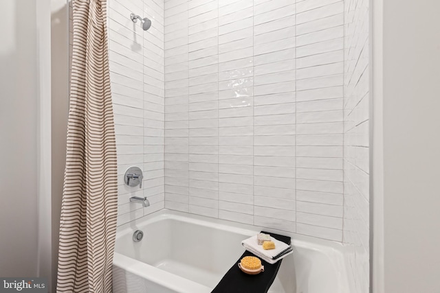 7175 12th St NW Unit 517, Washington, DC 20011 - bathroom featuring shower / bath combo with shower curtain