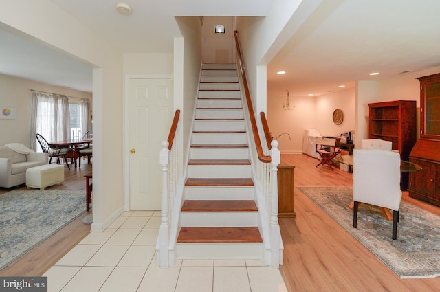 2404 Stokes Rd, Mount Laurel, NJ 08054 - stairway featuring wood finished floors, baseboards, and recessed lighting