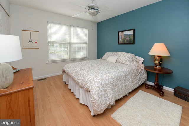 2404 Stokes Rd, Mount Laurel, NJ 08054 - bedroom with light wood finished floors, baseboards, and a ceiling fan
