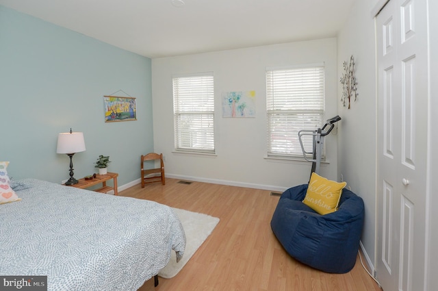 2404 Stokes Rd, Mount Laurel, NJ 08054 - bedroom with light wood-type flooring and baseboards