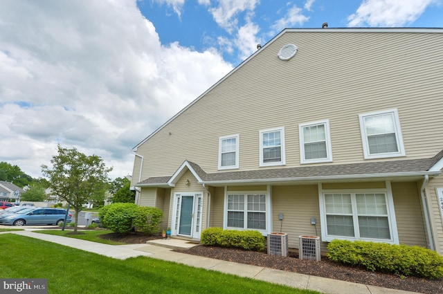 2404 Stokes Rd, Mount Laurel, NJ 08054 - townhome / multi-family property with central air condition unit and a front yard