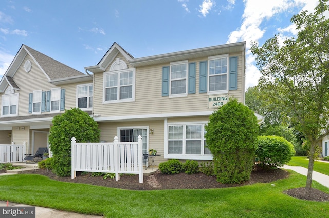 2404 Stokes Rd, Mount Laurel, NJ 08054 - townhome / multi-family property featuring a front yard