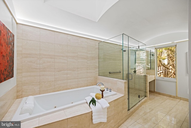 8901 Potomac Station Ln, Potomac, MD 20854 - full bathroom featuring a whirlpool tub, a shower stall, and tile patterned floors