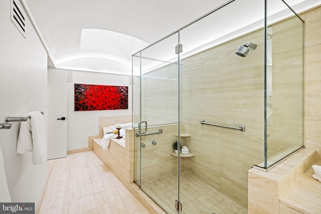 8901 Potomac Station Ln, Potomac, MD 20854 - bathroom with a stall shower, tile patterned floors, a bath, and baseboards