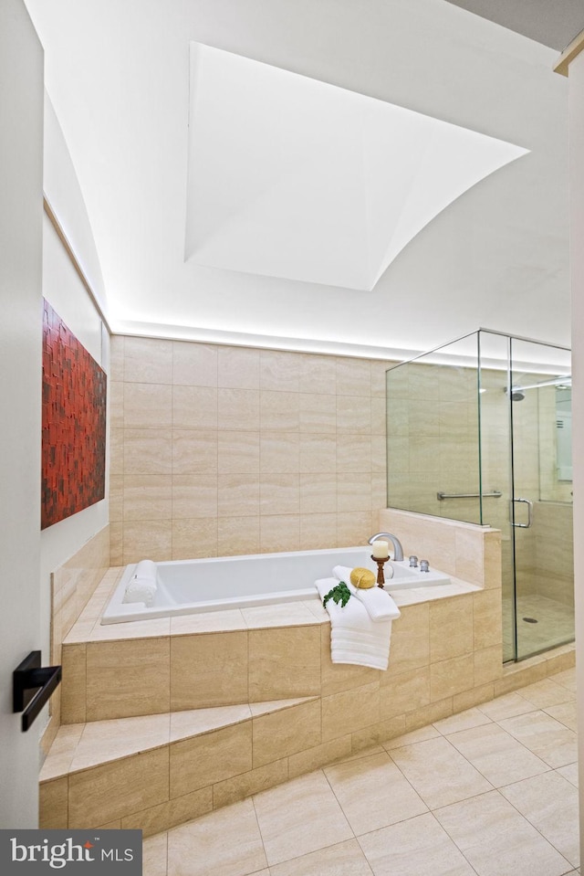 8901 Potomac Station Ln, Potomac, MD 20854 - bathroom with tile patterned floors, a bath, and a shower stall