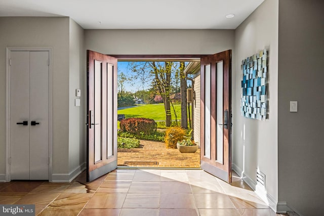 8901 Potomac Station Ln, Potomac, MD 20854 - entrance foyer featuring baseboards and light tile patterned floors