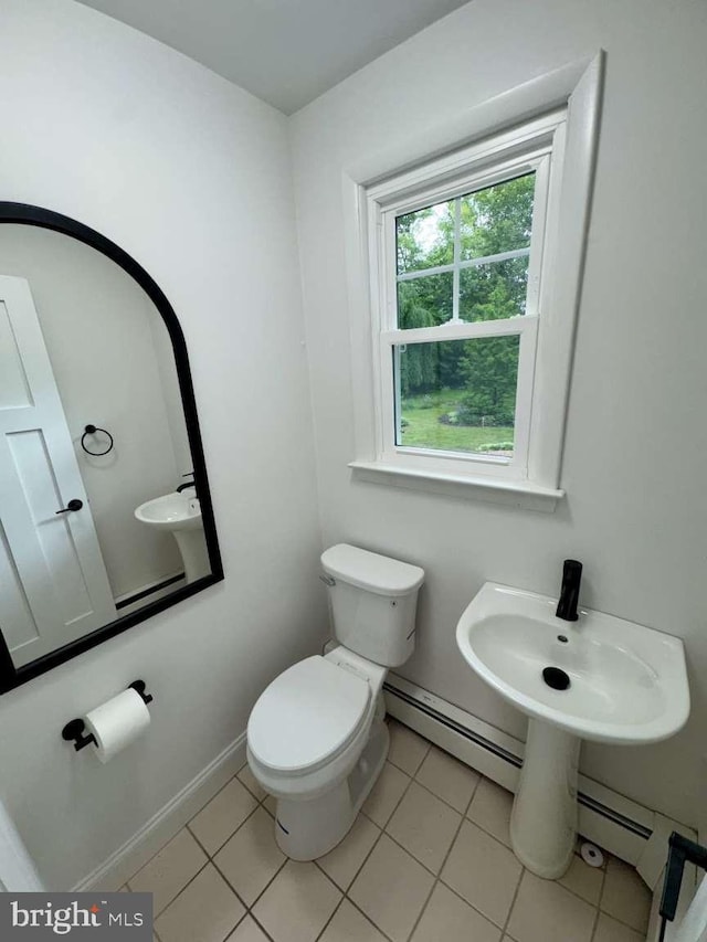 127 Homestead Dr, Doylestown, PA 18901 - bathroom with toilet, tile patterned flooring, and a baseboard heating unit