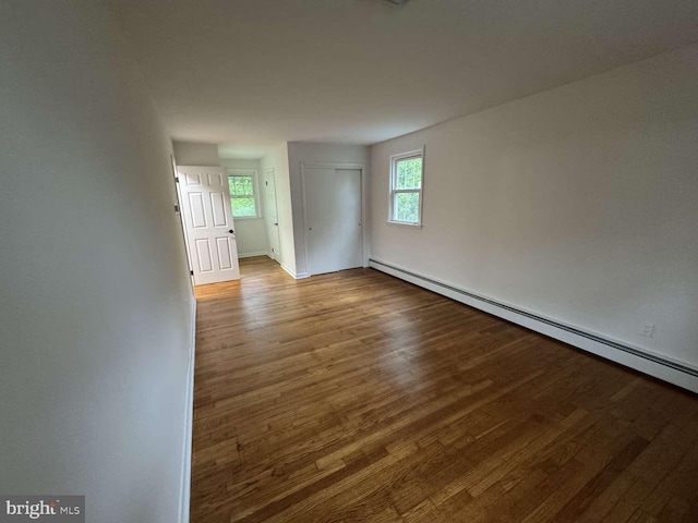 127 Homestead Dr, Doylestown, PA 18901 - unfurnished room with a baseboard radiator, wood finished floors, and baseboards