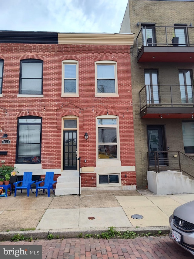 1622 E Clement St, Baltimore, MD 21230 - multi unit property featuring brick siding and entry steps