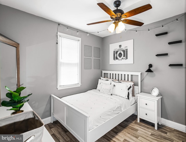 1200 Hessian Ave, National Park, NJ 08063 - bedroom featuring track lighting, baseboards, wood finished floors, and ceiling fan