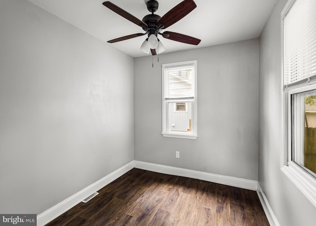 1200 Hessian Ave, National Park, NJ 08063 - empty room with baseboards, dark wood-type flooring, and a ceiling fan