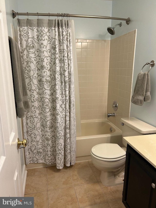 15496 Travailer Ct, Woodbridge, VA 22193 - full bath featuring shower / bath combo with shower curtain, vanity, toilet, and tile patterned flooring