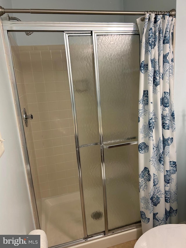 15496 Travailer Ct, Woodbridge, VA 22193 - full bath with a stall shower and toilet