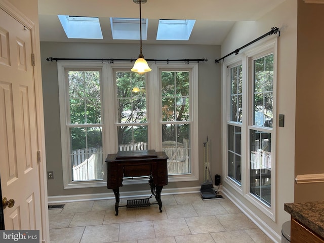 15496 Travailer Ct, Woodbridge, VA 22193 - doorway featuring a skylight, baseboards, and healthy amount of natural light