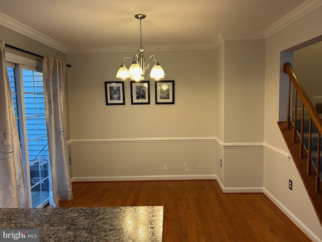15496 Travailer Ct, Woodbridge, VA 22193 - unfurnished dining area featuring wood finished floors, ornamental molding, a chandelier, baseboards, and stairway