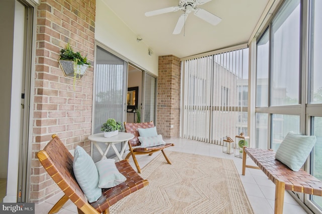 2904 N Leisure World Blvd Unit 517, Silver Spring, MD 20906 - sunroom / solarium with tile patterned flooring, a ceiling fan, brick wall, and a wall of windows