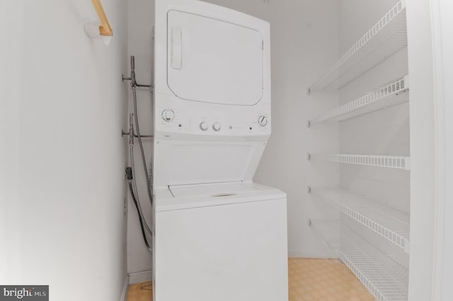 2904 N Leisure World Blvd Unit 517, Silver Spring, MD 20906 - laundry area featuring estacked washer and dryer and light flooring