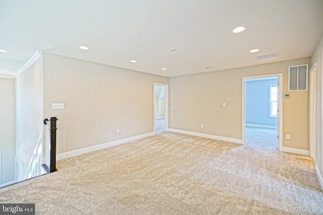 33557 Downing Cir, Lewes, DE 19958 - spare room with light colored carpet, recessed lighting, and ornamental molding
