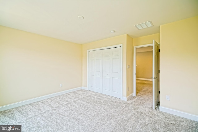 33557 Downing Cir, Lewes, DE 19958 - unfurnished bedroom featuring carpet and a closet