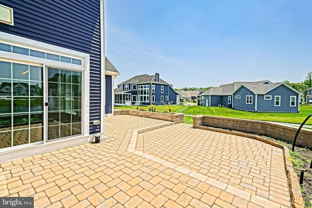33557 Downing Cir, Lewes, DE 19958 - view of patio featuring a residential view