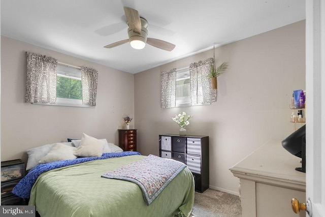 1326 Pine Grove Ave, Baltimore, MD 21237 - bedroom featuring light colored carpet, a ceiling fan, and baseboards