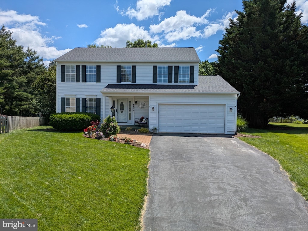 4106 Hartford Ct, Jefferson, MD 21755 - colonial home featuring asphalt driveway and an attached garage