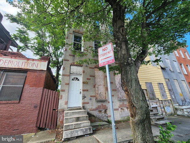 1431 E Preston St, Baltimore, MD 21213 - view of front of property featuring brick siding and entry steps