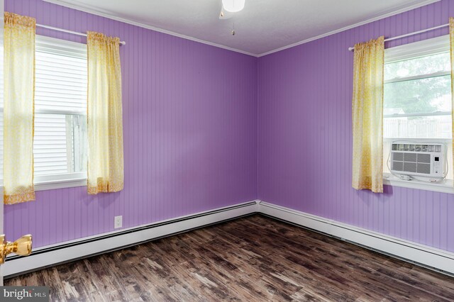 1230 Whitehall Ave, Easton, PA 18045 - spare room featuring ornamental molding, dark wood-style flooring, and cooling unit
